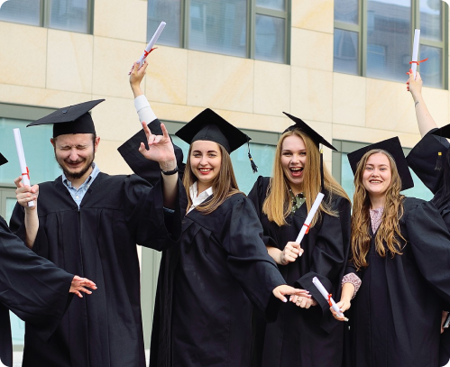 group diverse grads throwing caps up sky 6